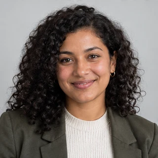 AI-generated portrait of fictional profile Priya Patel